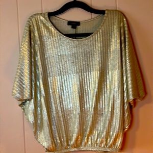 Gold shimmery top for casual or going out! Size small